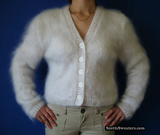 Woman's white hand-knit mohair cardigan sweater with buttons and long sleeves, small-medium size