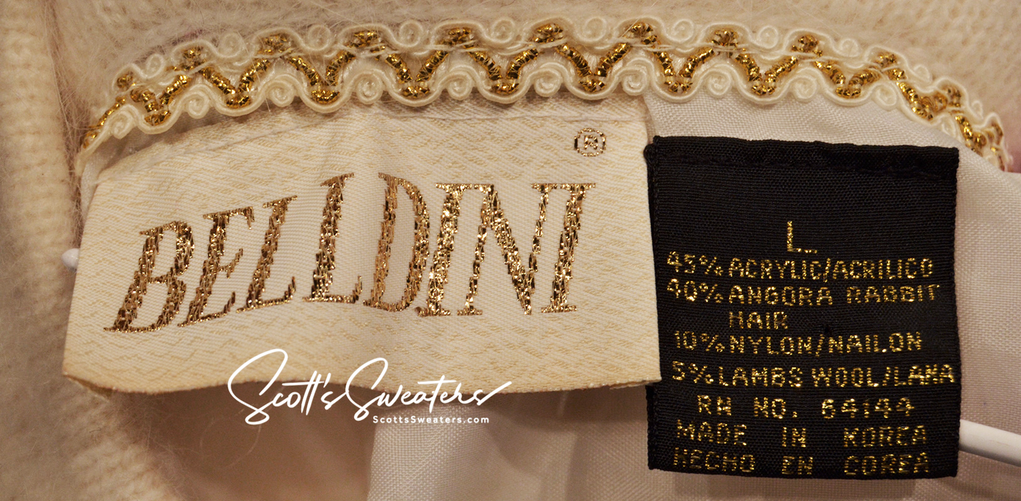 Close-up of Belldini label showing fabric composition and size L on a woman's white angora cardigan sweater