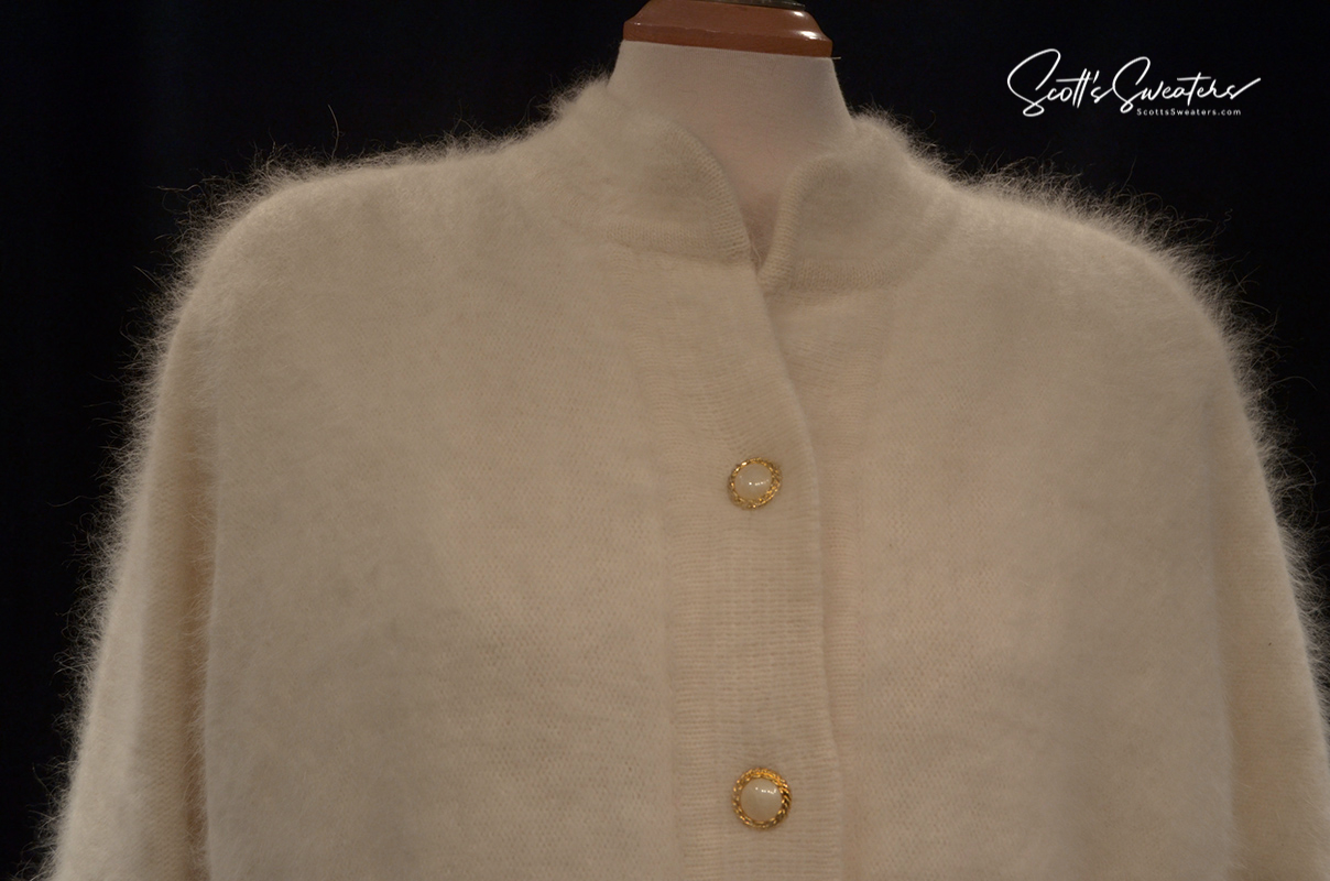 Woman's white angora cardigan sweater by Belldini with nylon lining and gold buttons in large size