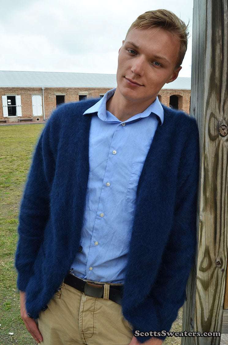 Men's ultra-soft angora cardigan sweater in navy blue worn outdoors