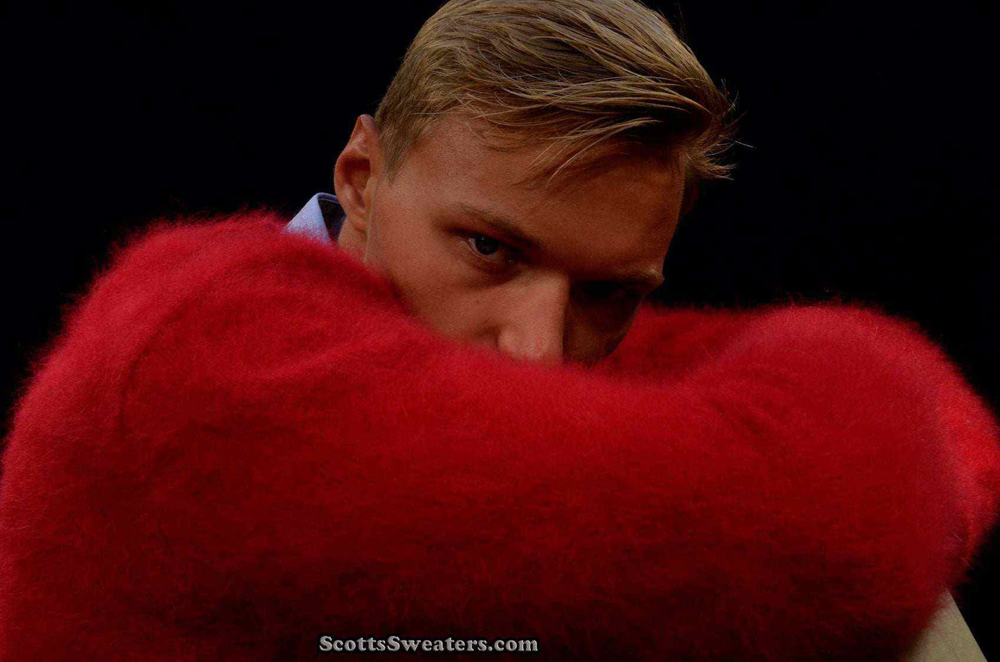 Men's ultra-soft red angora V-neck sweater close-up on model