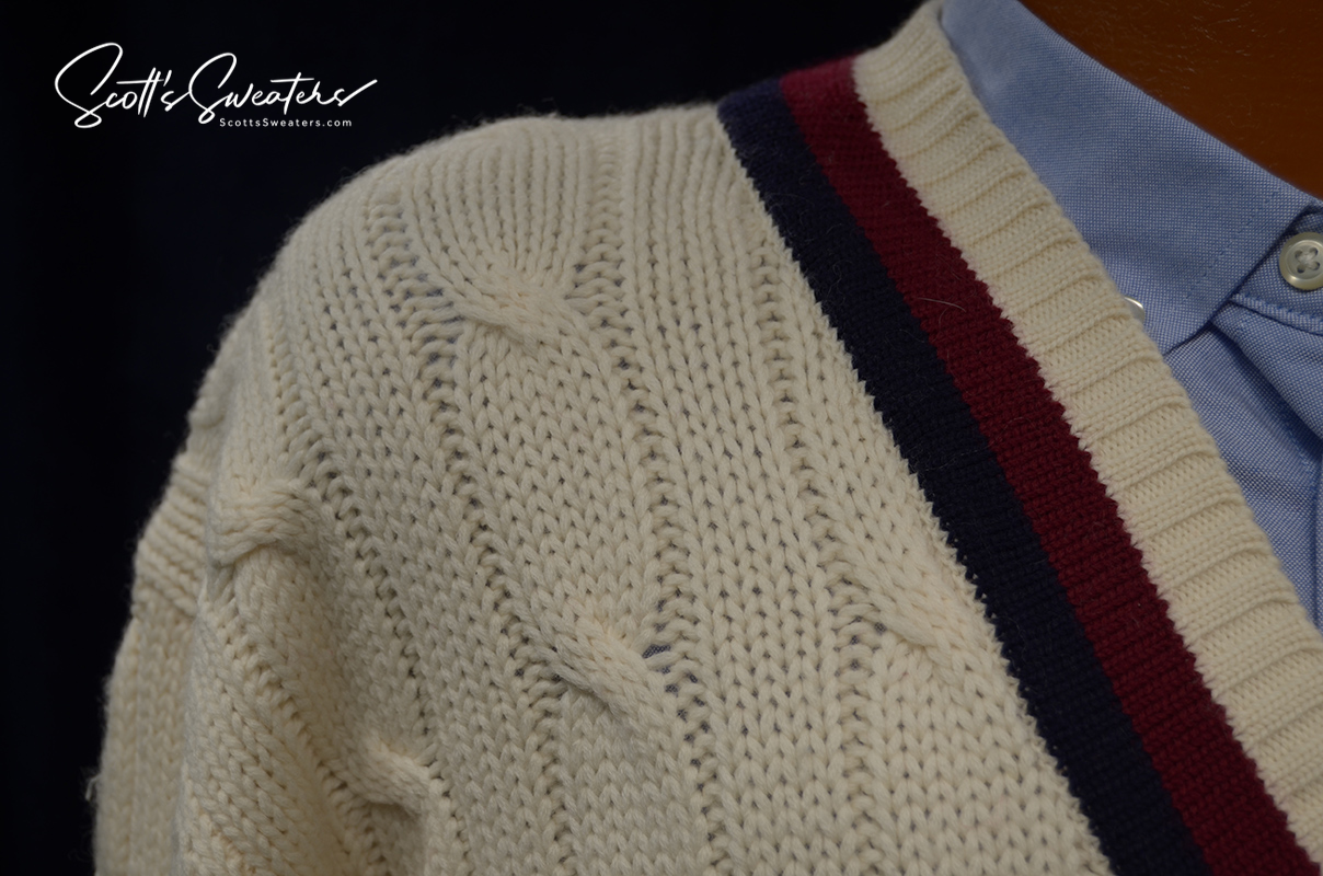 Original retro merino wool ivory cable-knit V-neck tennis sweater with navy and burgundy striped trim on collar and waist