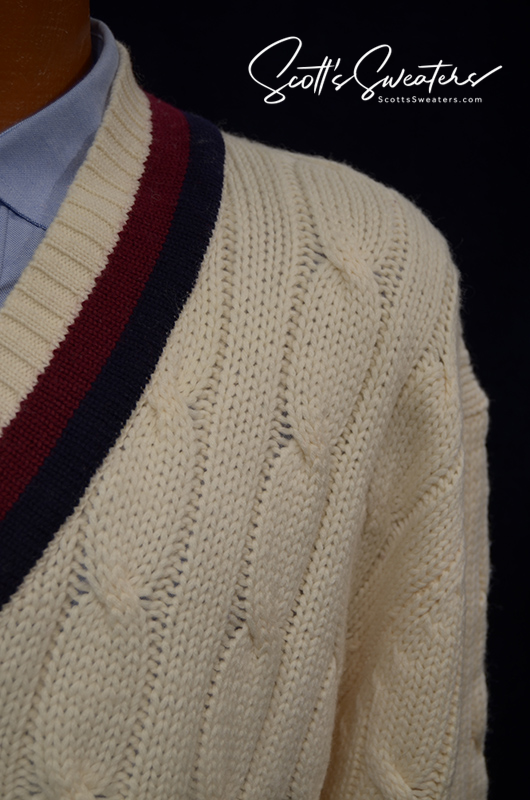 Original retro merino wool ivory cable-knit tennis sweater with navy and burgundy striped trim at V-neck and waist by Brooks Brothers