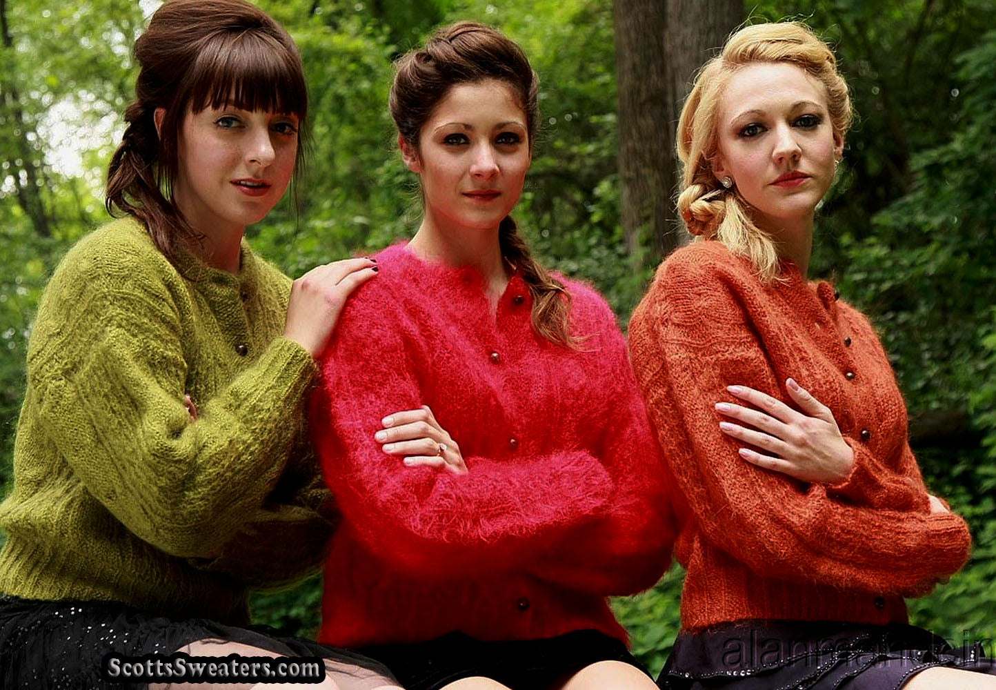 Three women wearing retro Italian mohair cardigans in green, red, and orange cable-knit styles outdoors.