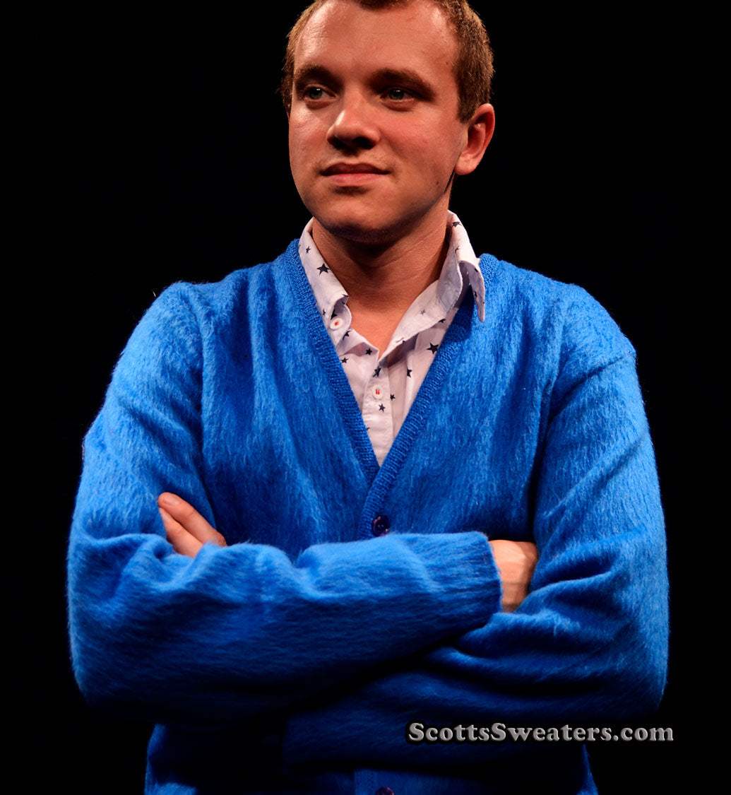 Men's royal-blue retro classic mohair cardigan sweater by Brent worn over a patterned shirt