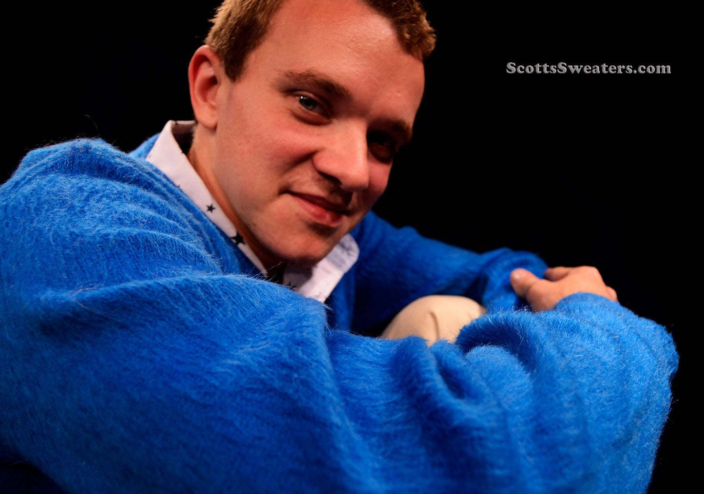 Man wearing a royal-blue men's retro classic mohair cardigan sweater by Brent