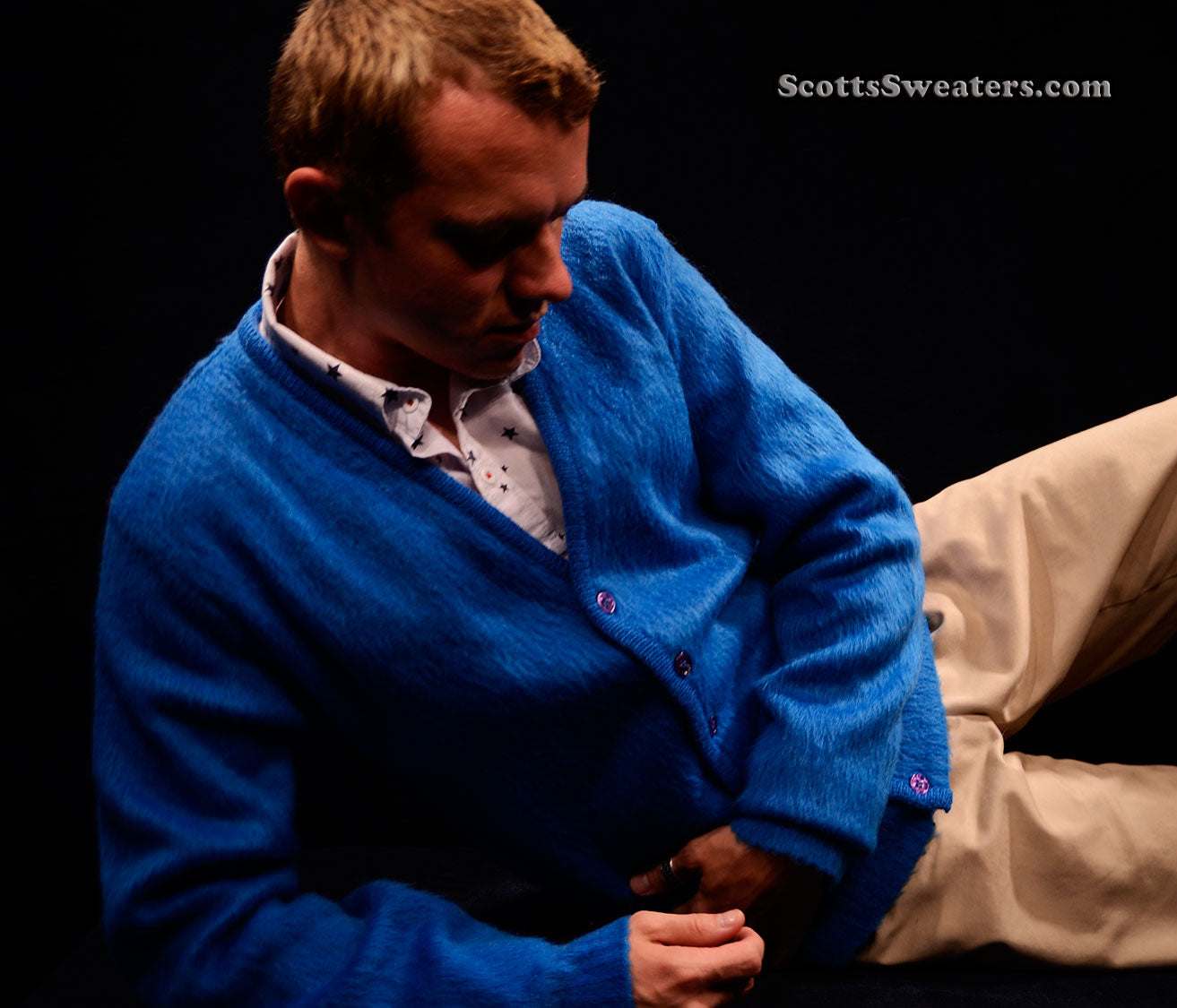 Men's retro classic royal-blue mohair cardigan sweater by Brent modeled reclining