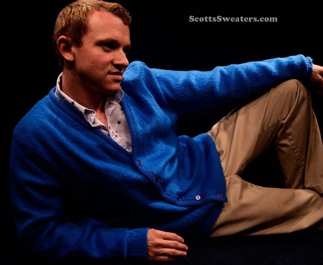 Men's retro classic royal-blue mohair cardigan sweater by Brent worn by man reclining