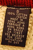 Men's Sporty V-neck Pullover cotton sweater label showing fabric and care details
