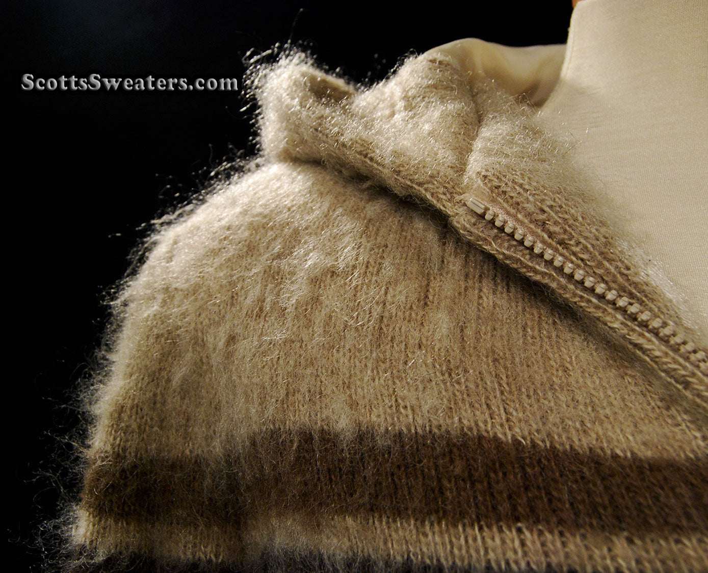 Close-up of a rare tan hooded Woman's Icelandic Wool Coat with horizontal three-tone stripes and nylon lining by Hilda Ltd.