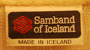 Ivory Icelandic wool crewneck sweater with grey-blue snowflake design by Samband of Iceland