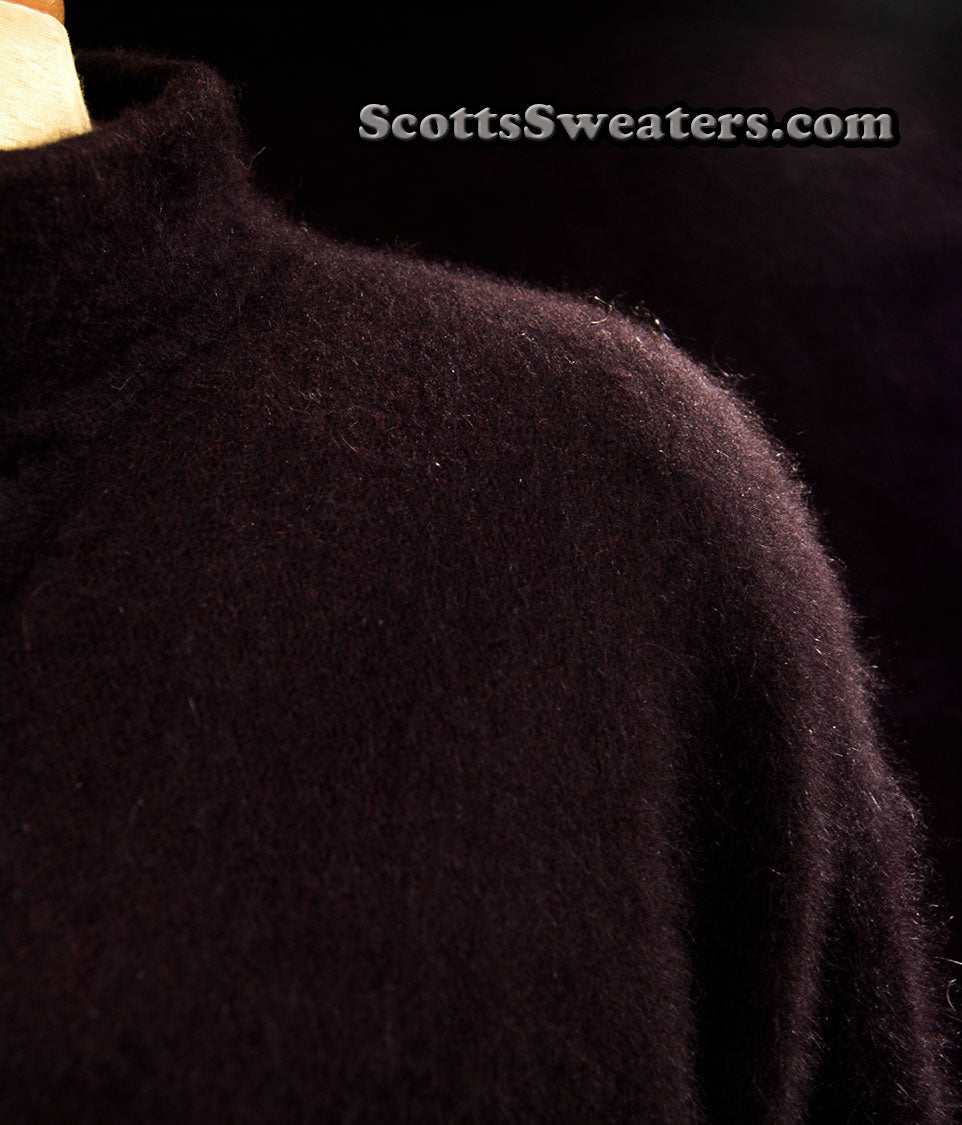 Woman's black angora cardigan sweater by Venesha with soft nylon lining, size large