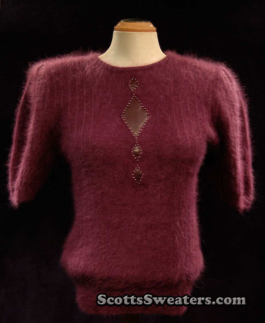 Deep-purple woman's 2-piece matching Angora sweater set with short-sleeve top and leather design appliqué