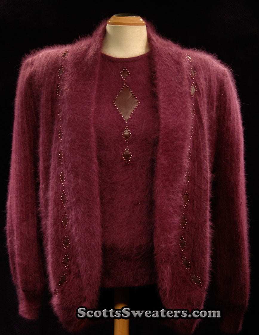 Deep-purple woman's 2-piece matching Angora sweater set with short-sleeve sweater and open-front cardigan featuring leather design appliqué