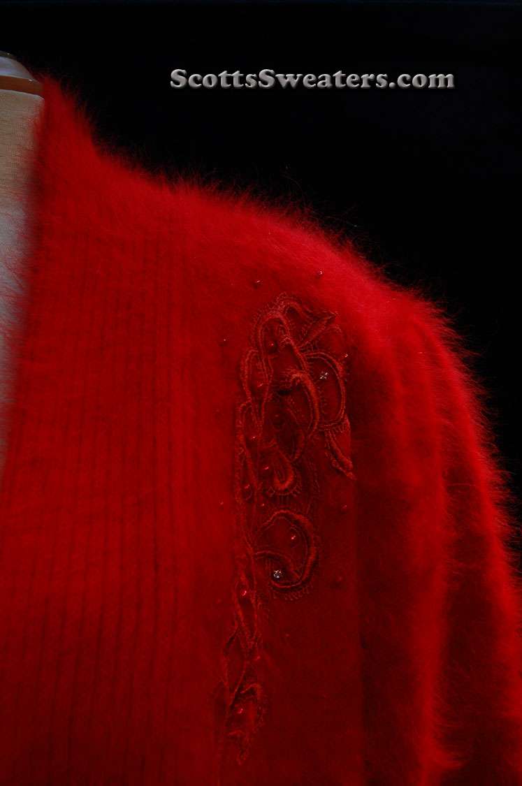 Plus-sized deep-red angora sweater-coat with embroidered design and side pockets by Lee Sands