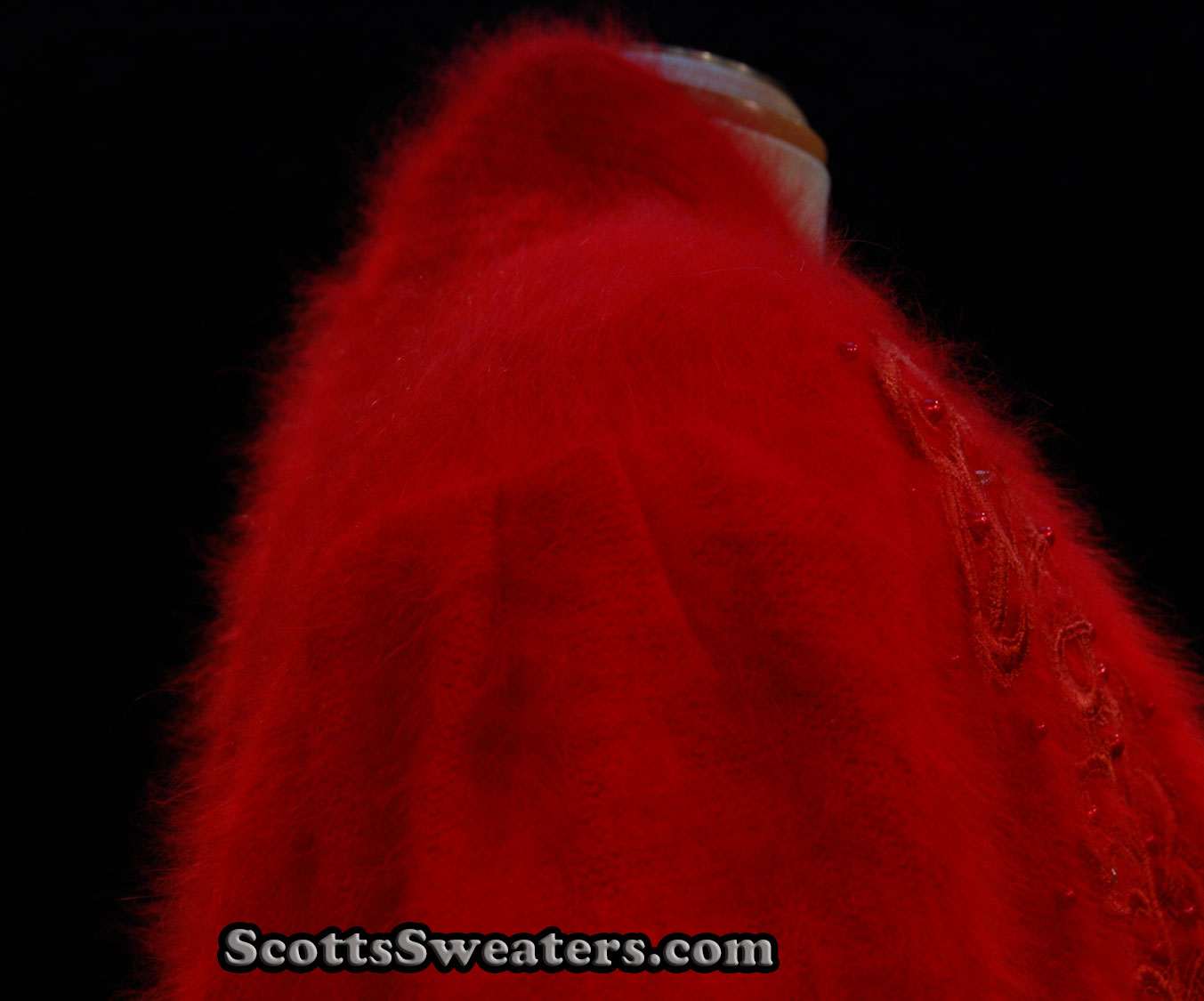 Plus-sized deep-red angora sweater-coat with embroidered design and side pockets by Lee Sands