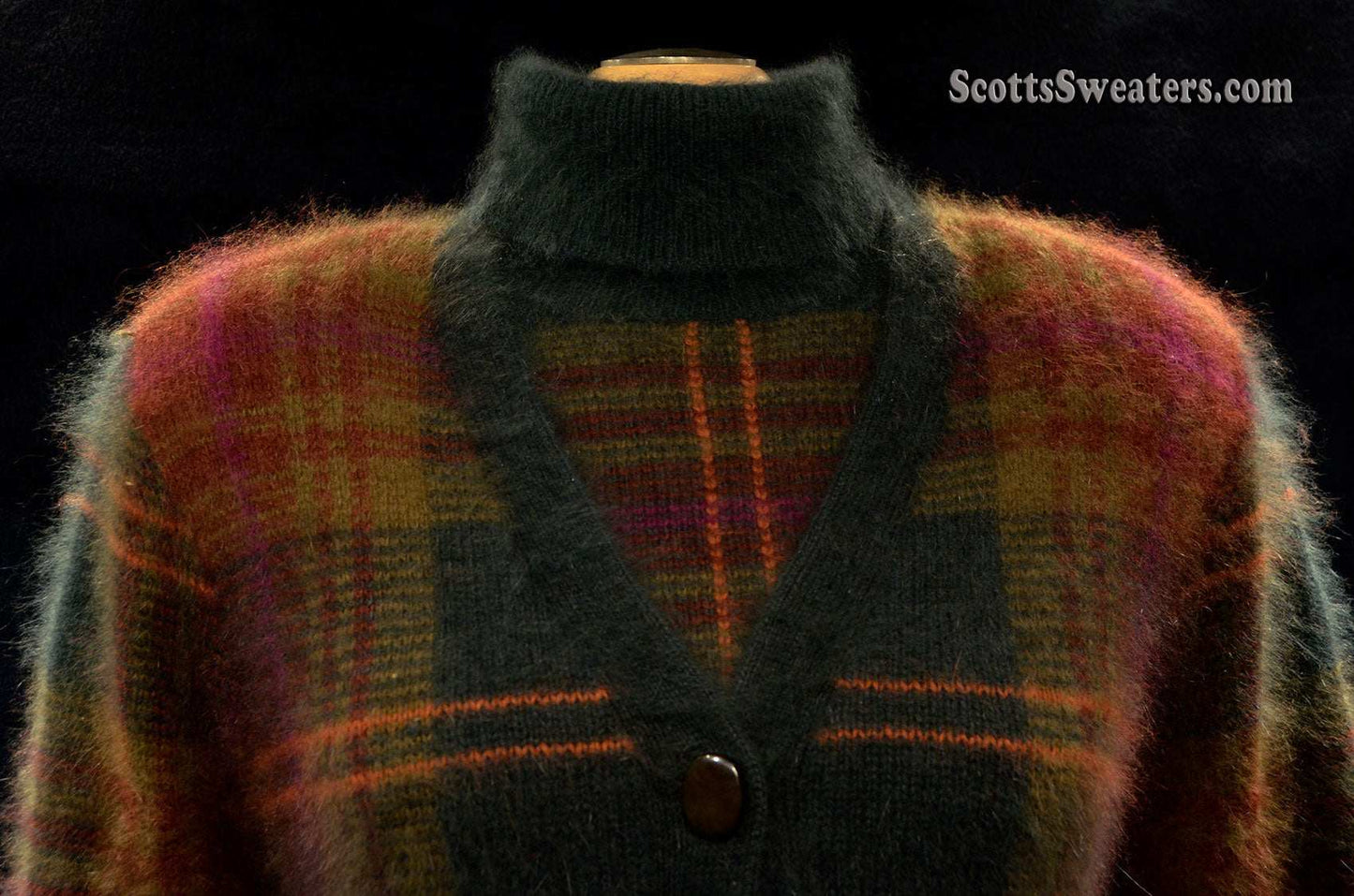 Woman's two-piece green and maroon plaid angora sweater set with turtleneck and button-front cardigan with side slash pockets
