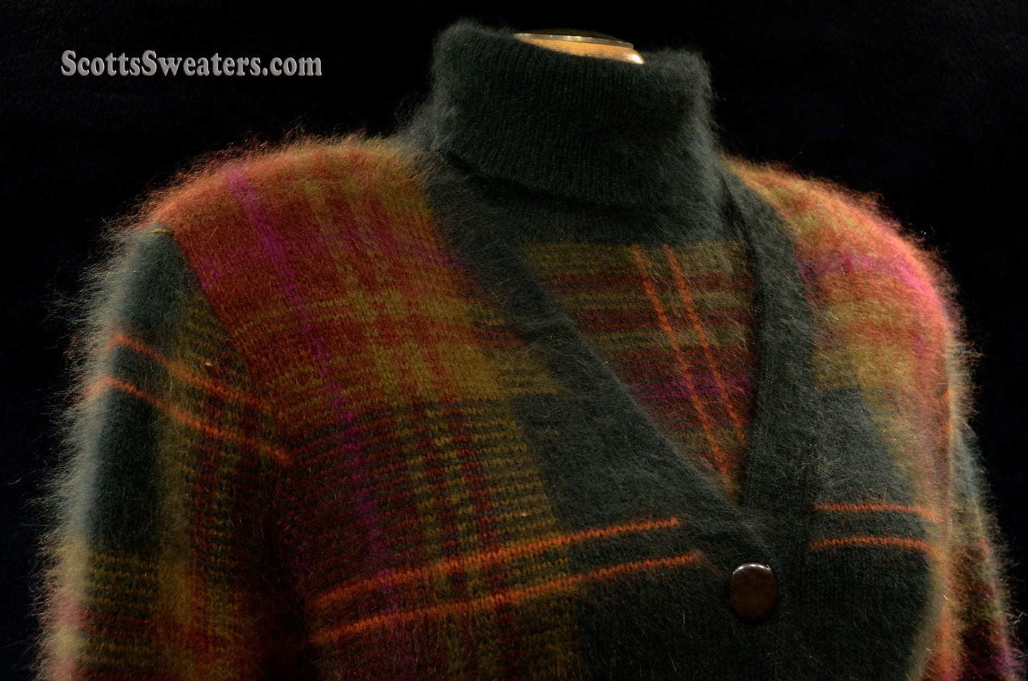 Woman's two-piece green and maroon plaid angora sweater set with turtleneck and button-front cardigan with side pockets