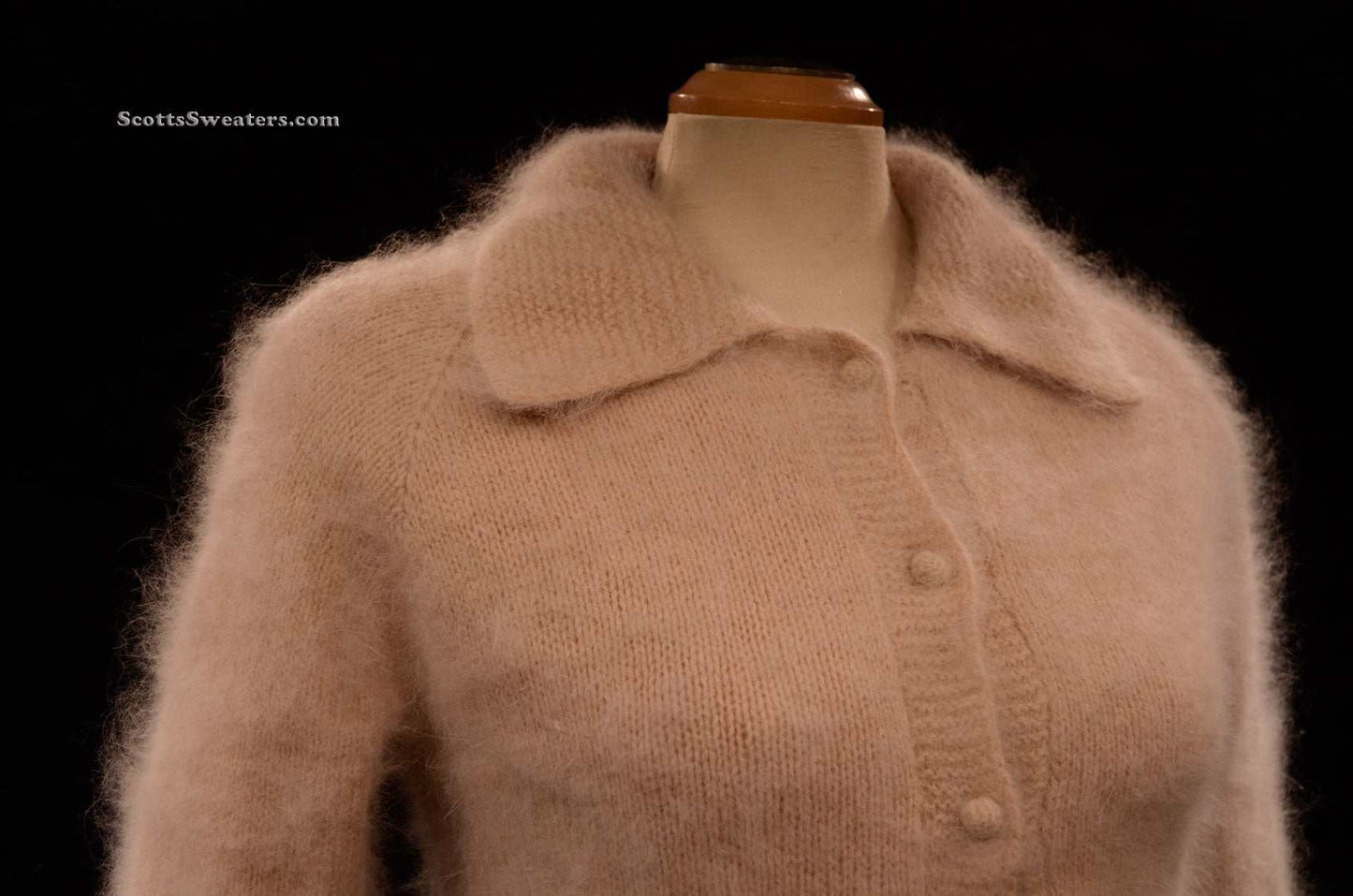 Woman's exquisite taupe angora sweater-shirt with nylon lining and soft fuzzy texture on mannequin