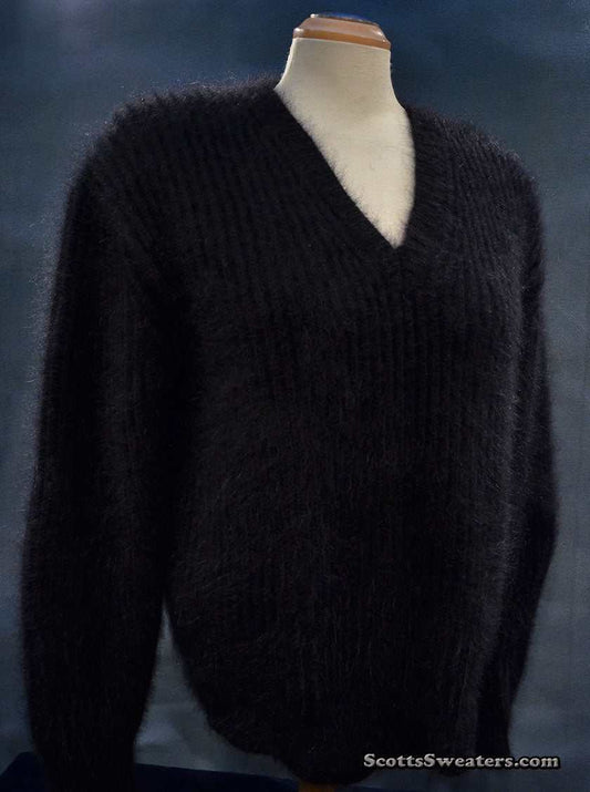 Woman's black angora V-neck sweater by Michael Kors displayed on mannequin