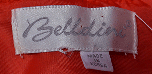 Woman's red angora shawl-neck cardigan sweater with gold buttons by Belldini