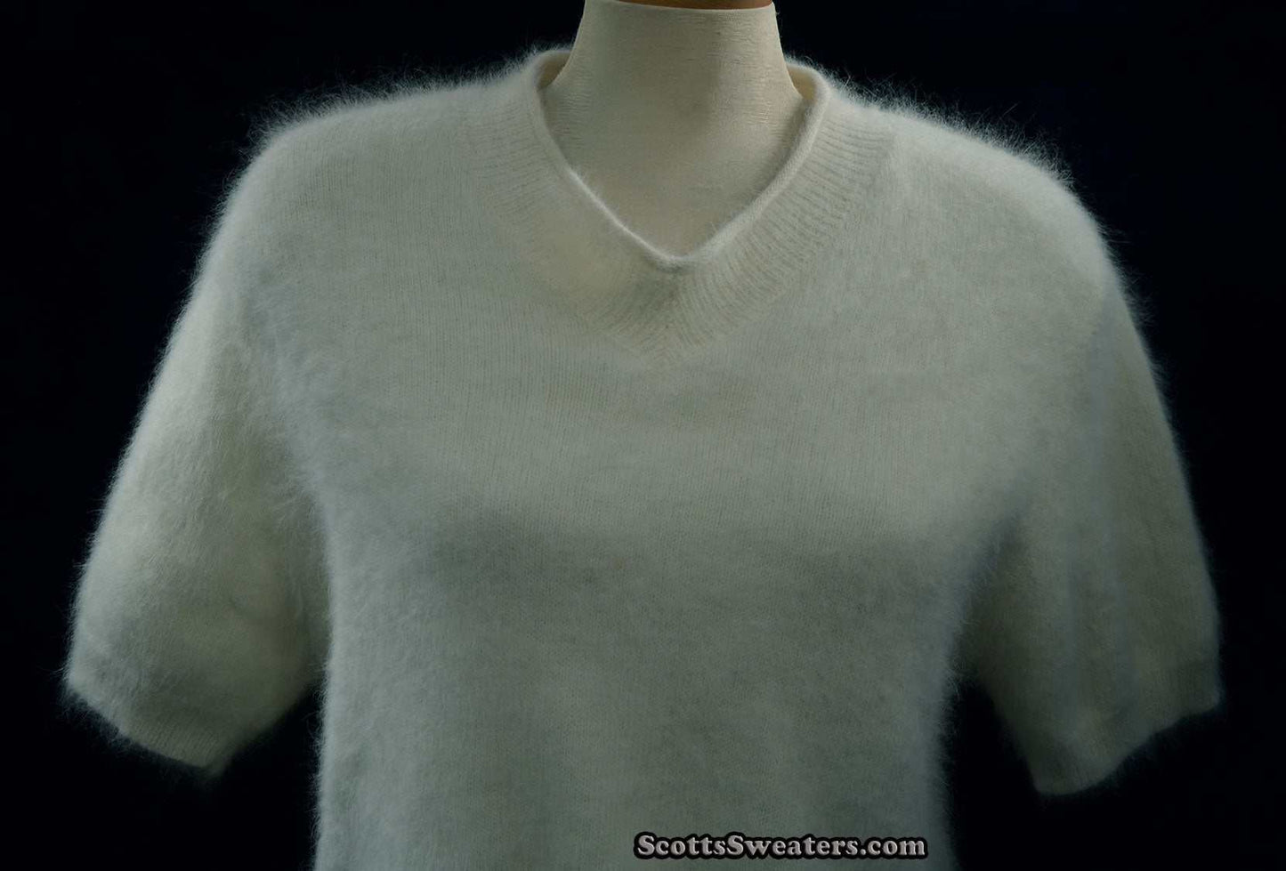 Woman's white short-sleeved V-neck angora sweater by Just Clothes