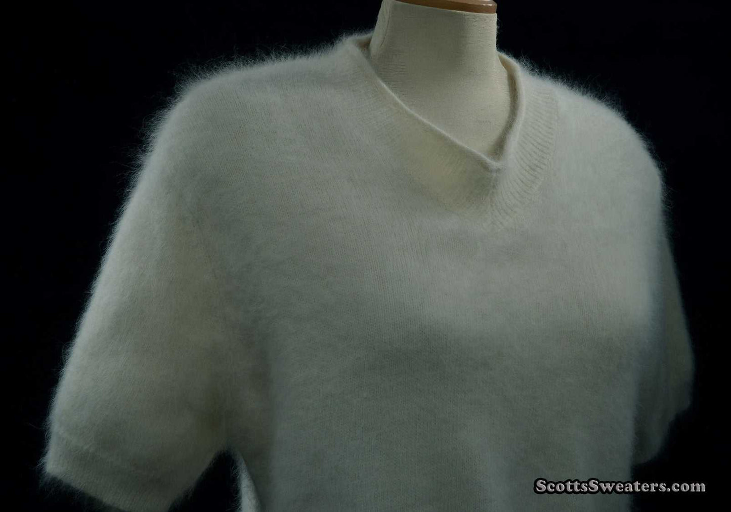 Woman's white short-sleeved V-neck angora sweater by Just Clothes