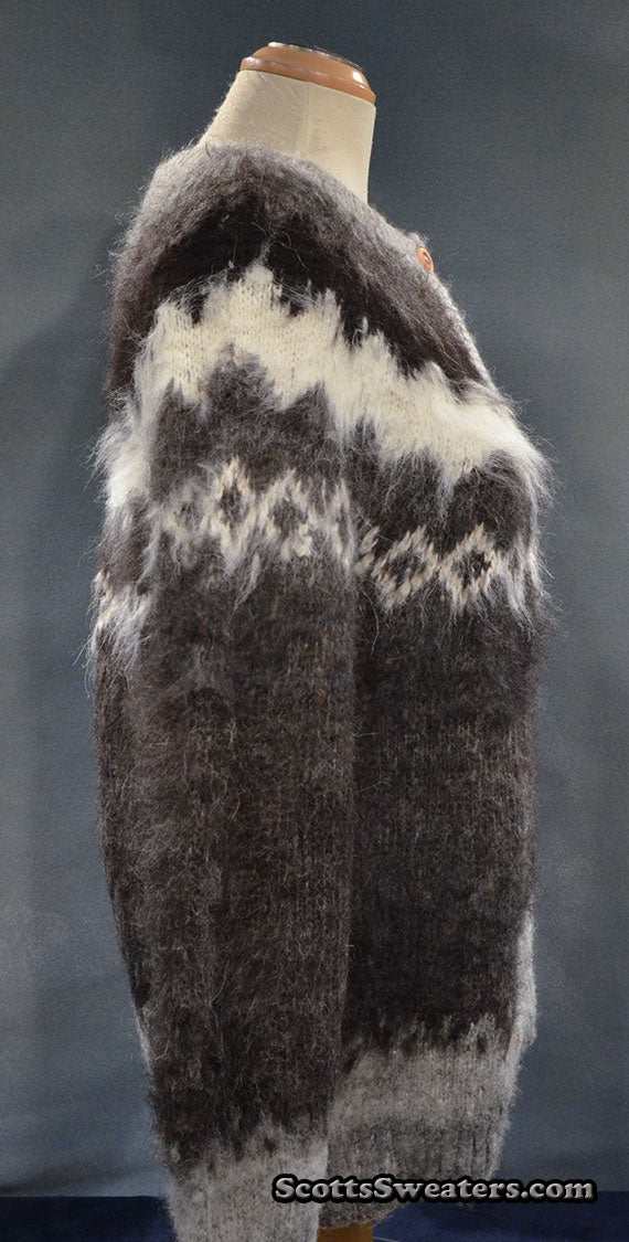 Woman's grey ultra-soft alpaca cardigan sweater with grey-white-black yoke design on mannequin