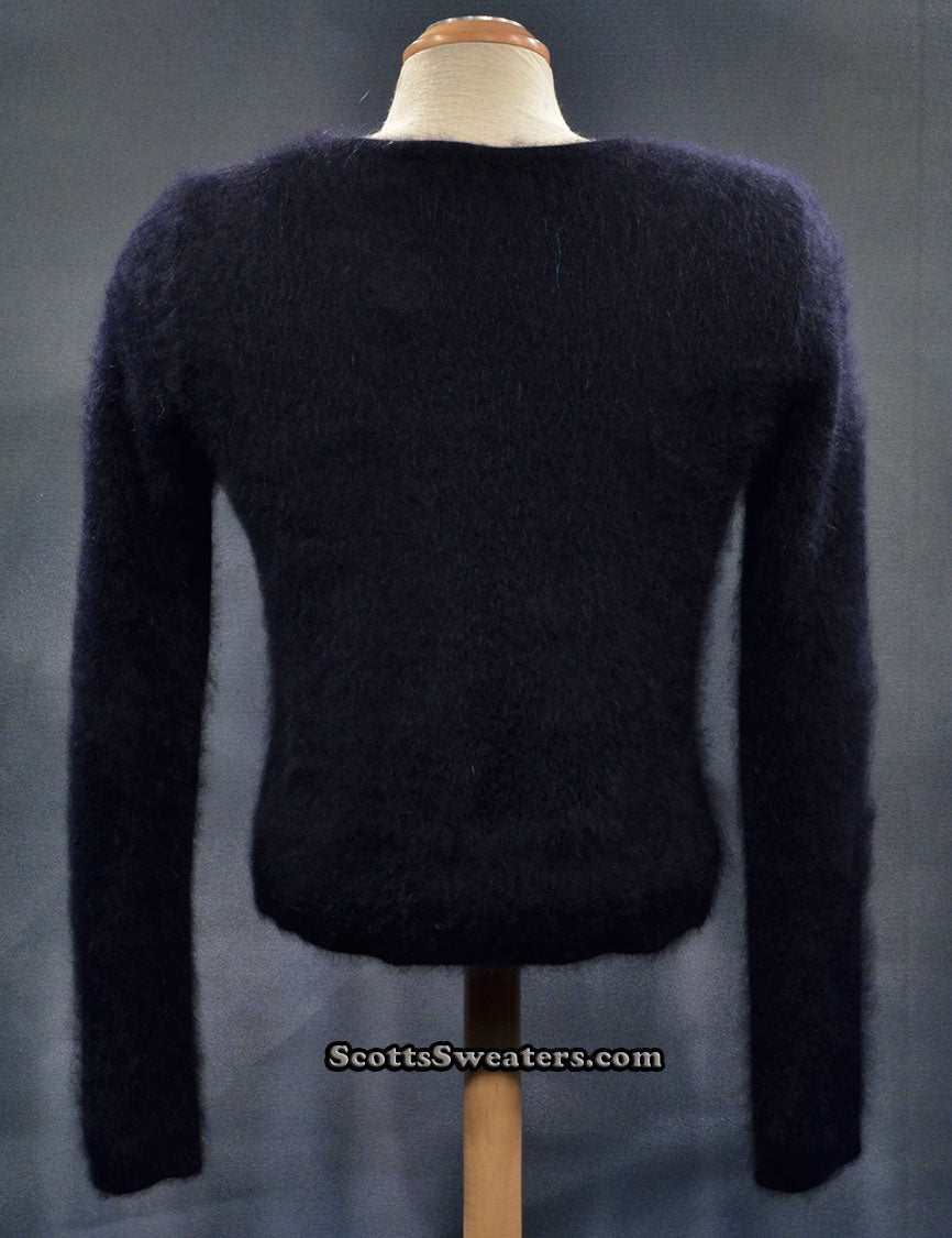 Girl's black angora cardigan sweater by BCBD Max Azria size large displayed on mannequin