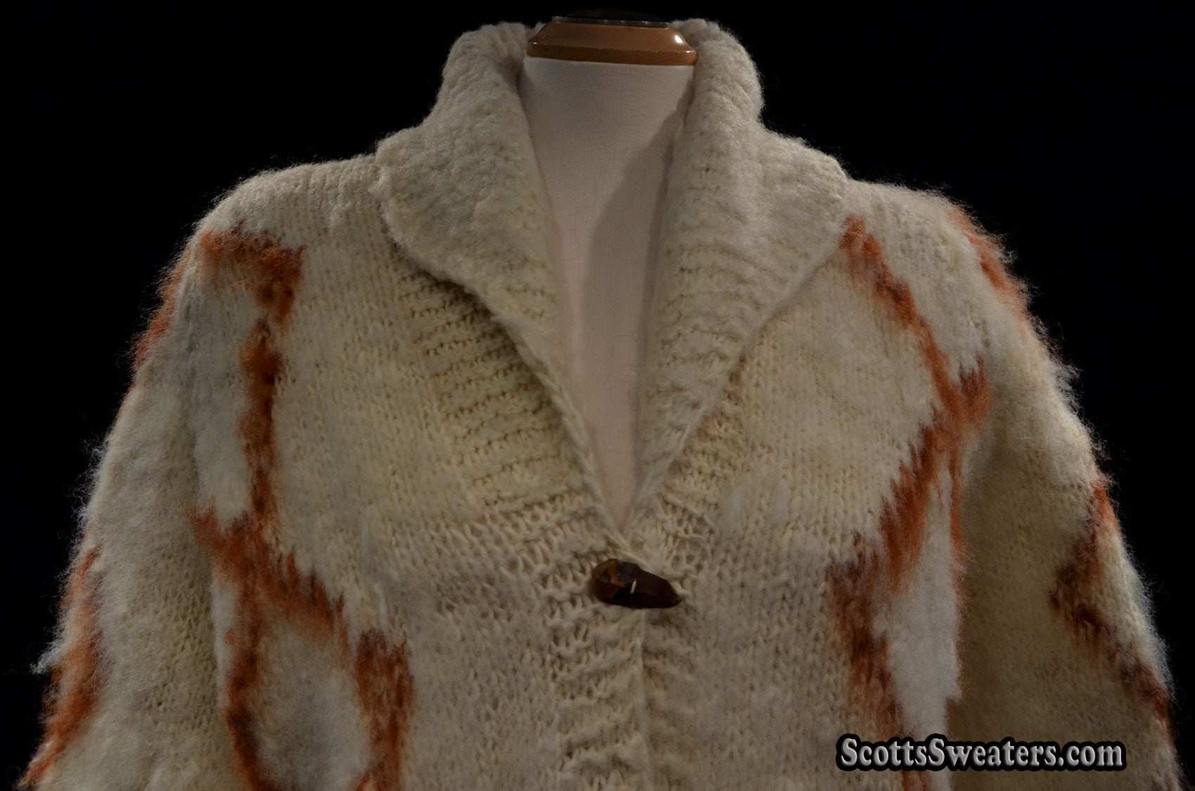 Woman's fuzzy Nepal wool hand-knit cardigan sweater with shawl collar and brown diamond pattern