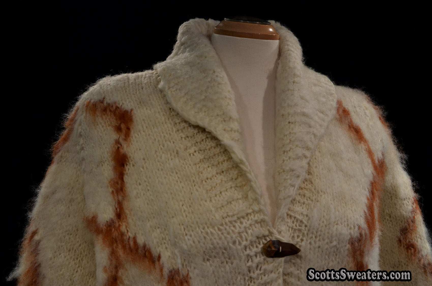 Woman's fuzzy Nepal wool hand-knit cardigan sweater with shawl collar and brown diamond knit design