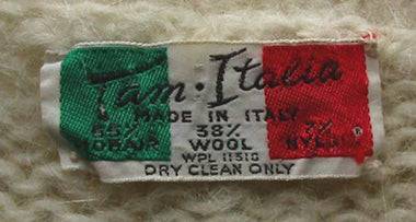 Woman's ivory cable-knit V-neck mohair-wool sweater label made in Italy by Tam Italia