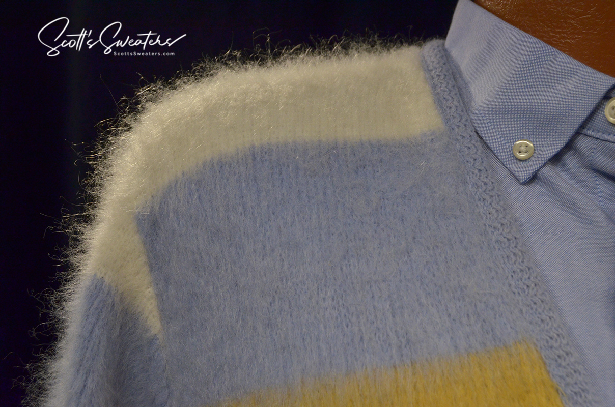 Four-color classic men's retro mohair cardigan sweater in white, blue, tan, and grey with metal buttons by Puritan Sportswear on a mannequin
