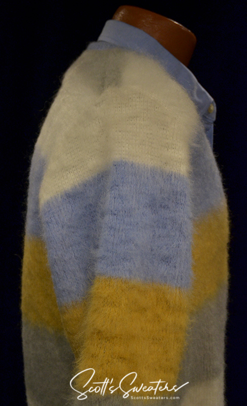 Four-color classic men's retro mohair cardigan sweater with white, blue, tan, and grey blocks on mannequin
