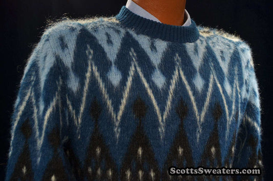 Blue fuzzy retro crewneck mohair sweater with black-light blue-white geometric design by Campus, X-Small size