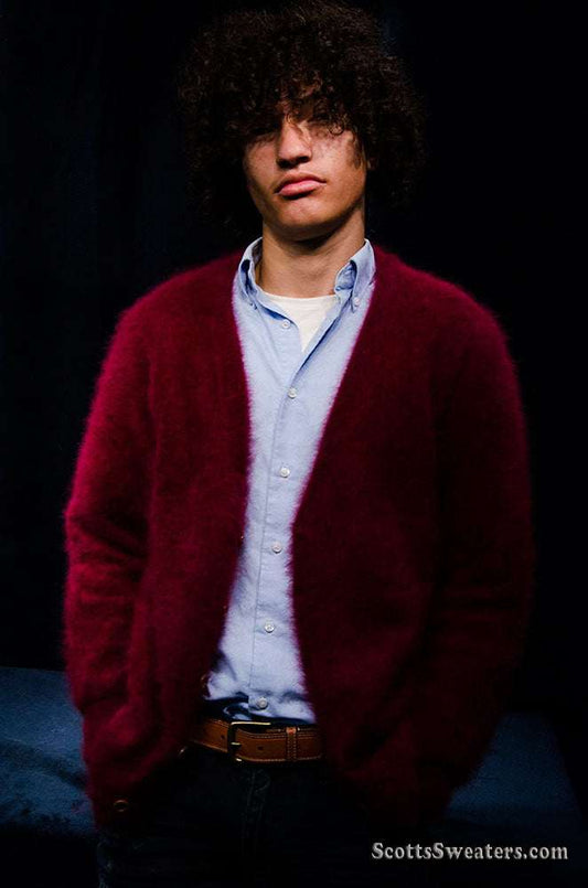 Men's ultra-soft angora cardigan sweater in deep red worn over light blue shirt