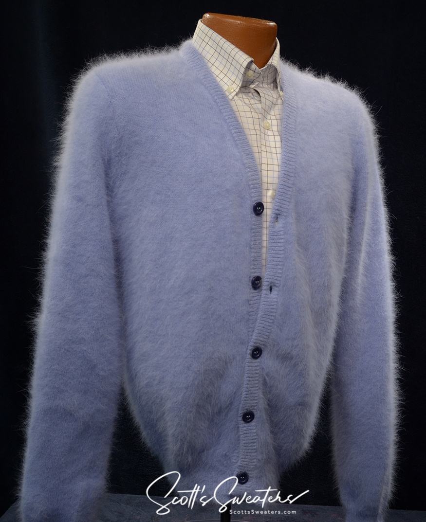 Men's ultra-soft light blue angora cardigan sweater with button front on mannequin
