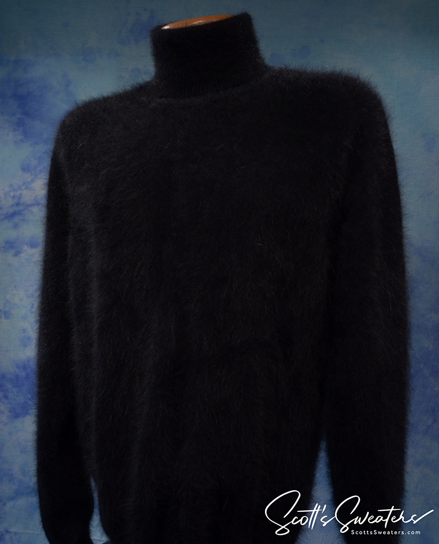 Black men's ultra-soft angora turtleneck sweater on mannequin against blue backdrop