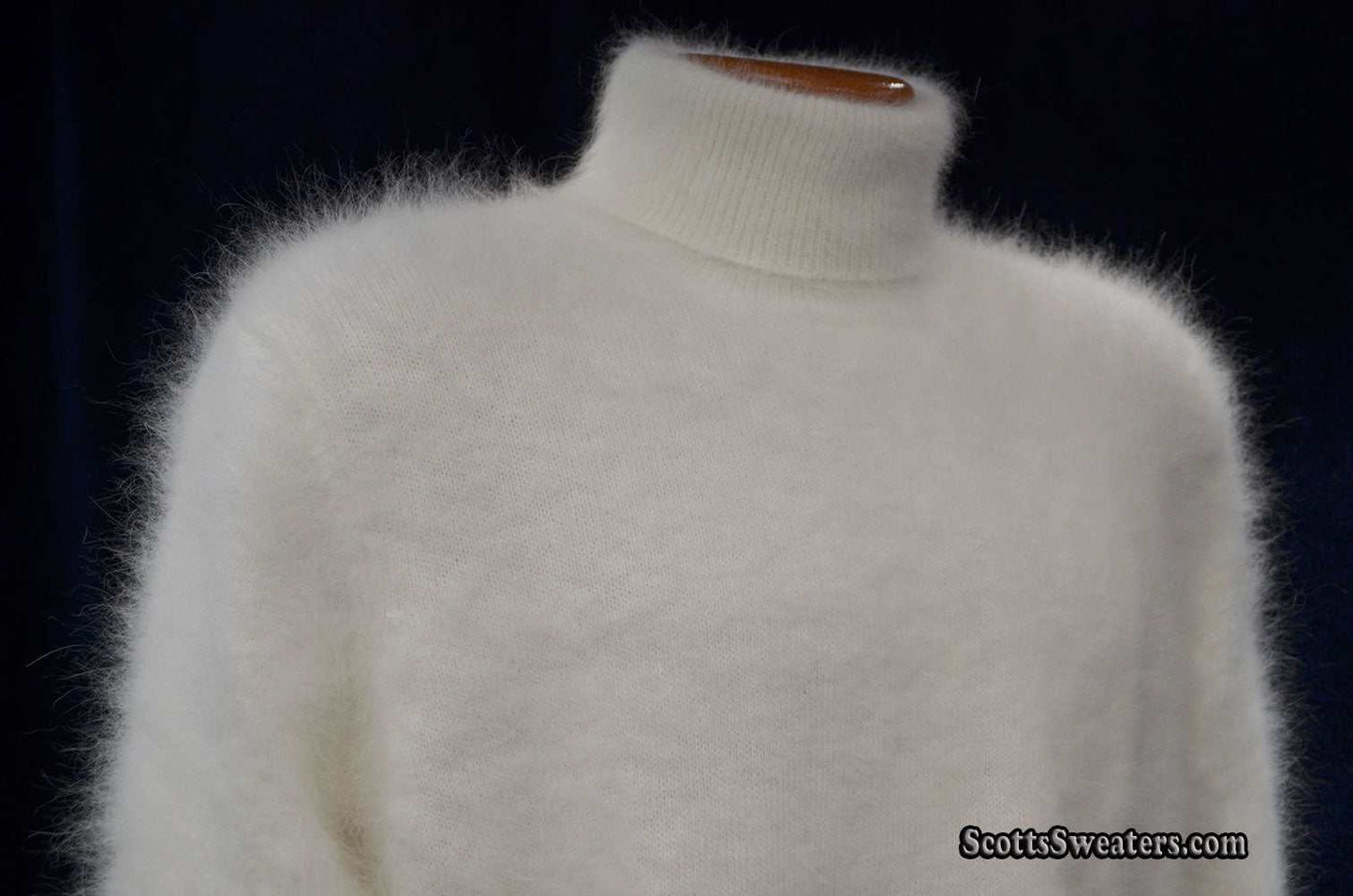 Men's ultra-soft white angora turtleneck sweater on mannequin against black background