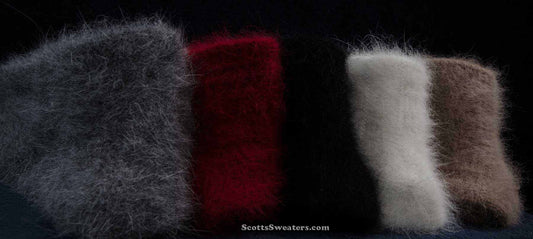 Men's angora dress socks in gray, red, black, white, and brown, made with 70% angora fibers for softness and warmth.