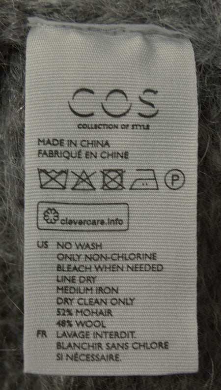 Men's luxuriously soft zipper-front mohair cardigan sweater with two front pockets by COS, size small-medium, forearm-length sleeves, blend of mohair and wool.