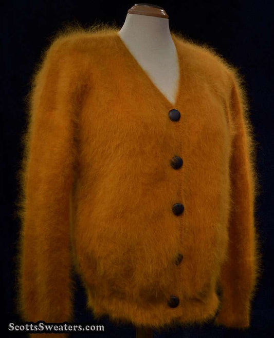 Woman's gold ultra-soft angora cardigan sweater with black buttons, medium size