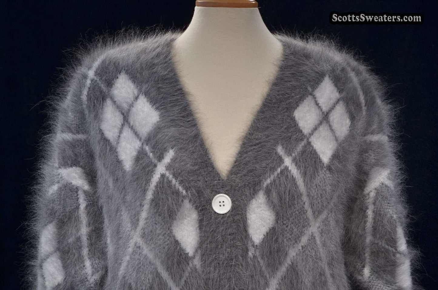 Woman's super-soft grey and white argyle angora cardigan sweater with button front in medium size