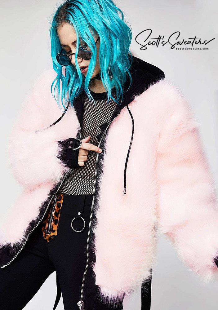 Punk style thick fluffy faux-fur jacket with zipper front, hanging straps, metal D-rings, and mohawk hood detail.