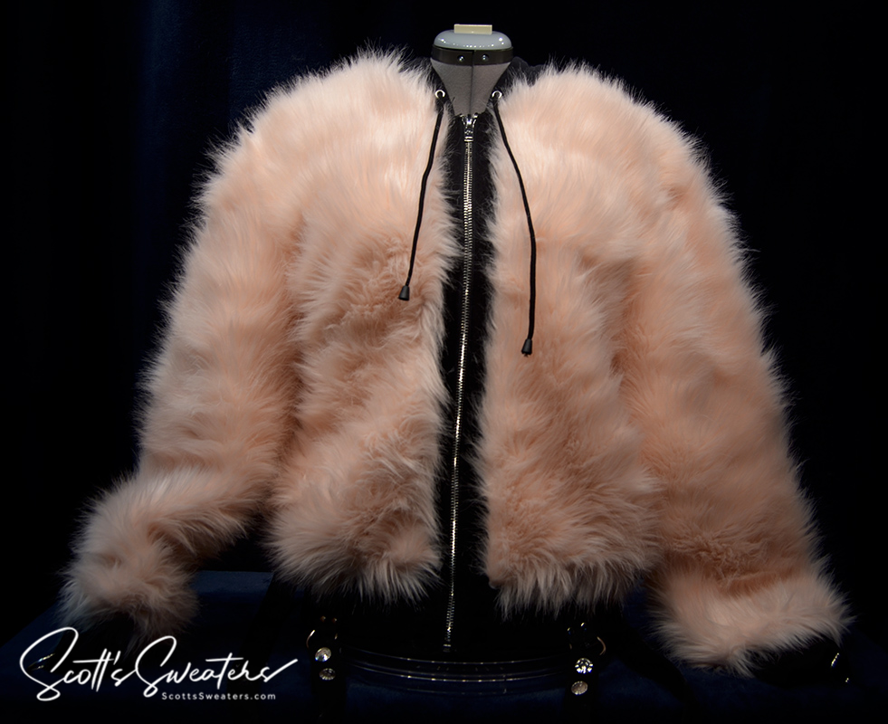 Punk style thick and fluffy light pink faux-fur jacket with zipper front and black hoodie strings