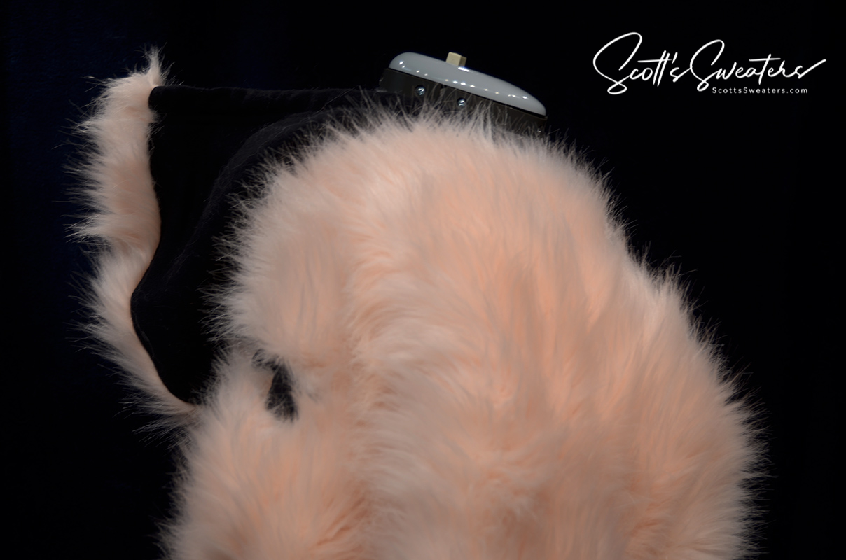 Punk style thick and fluffy faux-fur jacket with zipper front and Mohawk hood design