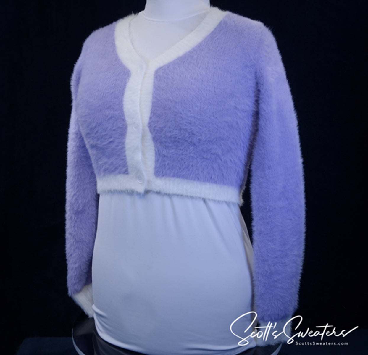 Girl's or woman's soft purple plush eyelash cardigan sweater with white trim