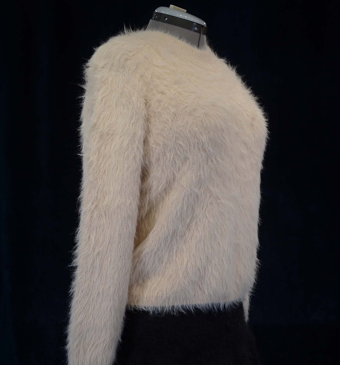 Woman's fuzzy beige plush eyelash crewneck sweater by Lou & Grey on mannequin