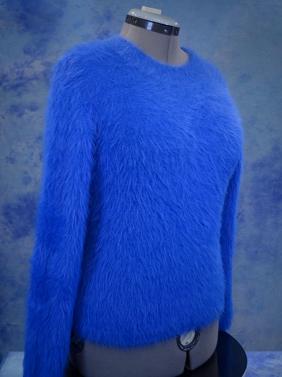 Woman's fuzzy royal-blue plush eyelash crewneck sweater by Lou & Grey on a mannequin
