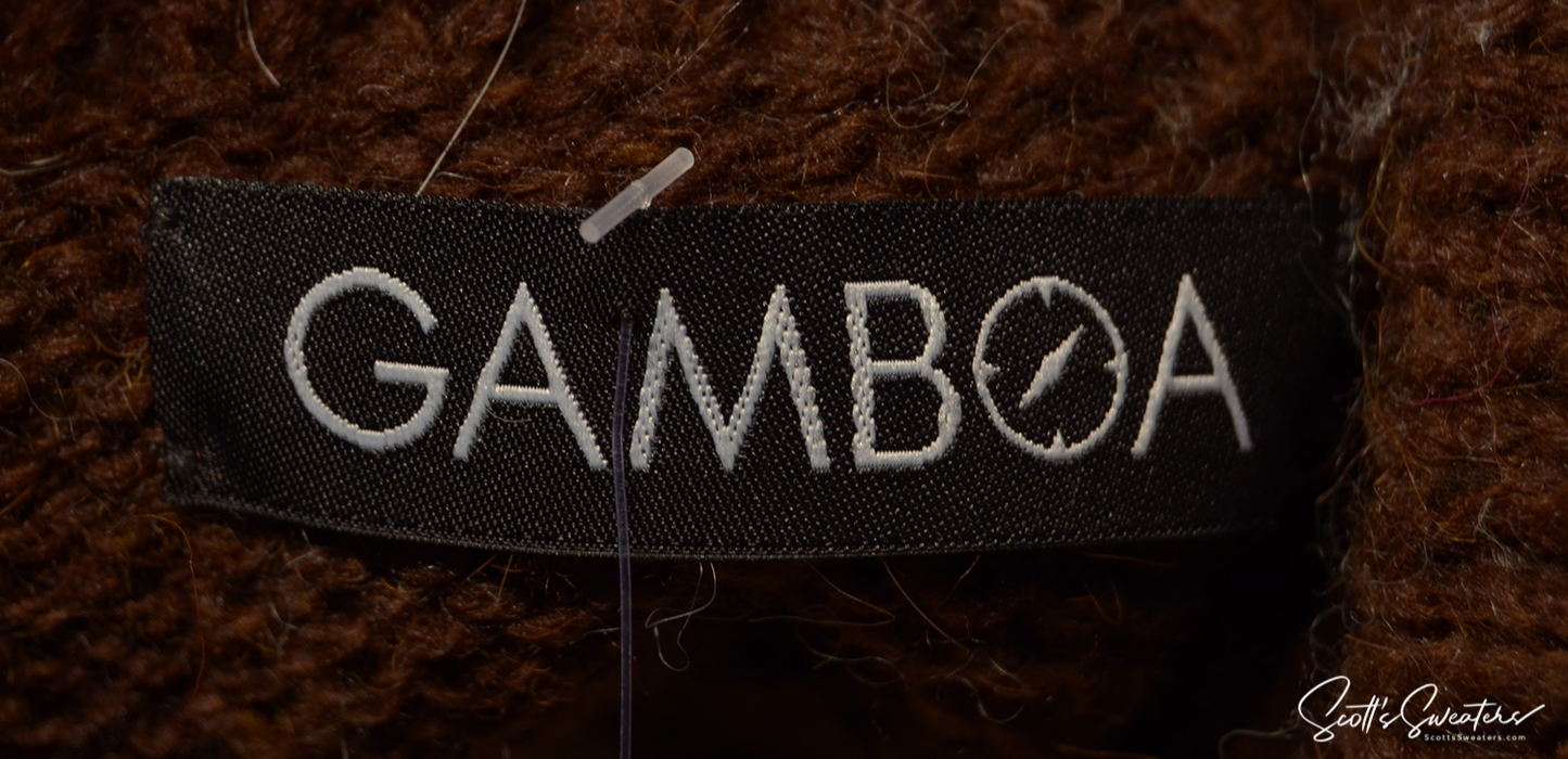 Close-up of Gamboa label on dark brown brushed alpaca men's soft alpaca crewneck sweater